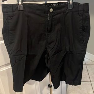 Reel Legends flat front, Dri fit fishing shorts. Size 42